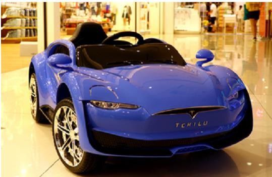 2023 Voiture électrique pour enfants en voiture avec télécommande 12V quatre roues deux places