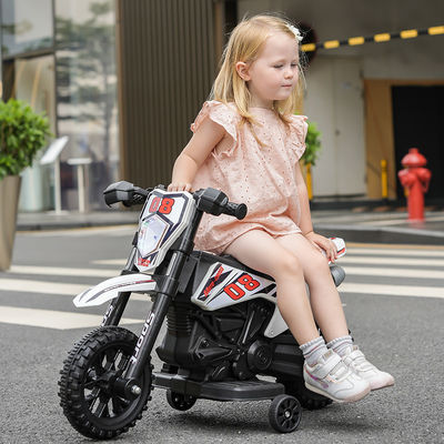Enfants en plastique montent une moto électrique avec de la musique rouge bleu blanc pour les enfants