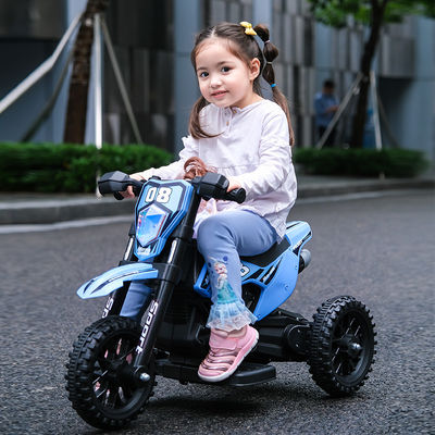 Enfants en plastique montent une moto électrique avec de la musique rouge bleu blanc pour les enfants