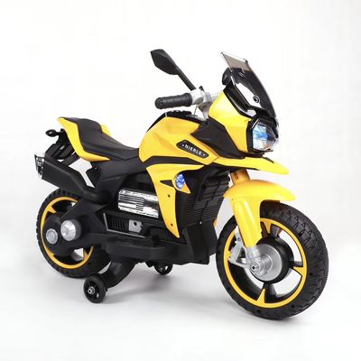 Rouler sur une moto électrique jouet pour enfants et roues lumineuses