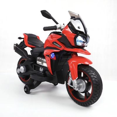 Rouler sur une moto électrique jouet pour enfants et roues lumineuses