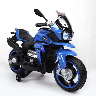 Rouler sur une moto électrique jouet pour enfants et roues lumineuses