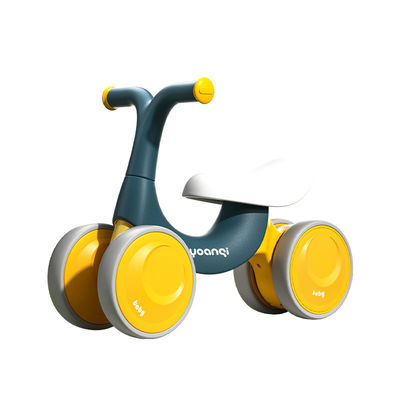 Voiture d'équilibre en plastique orange avec patin à roulettes silencieux et design vert