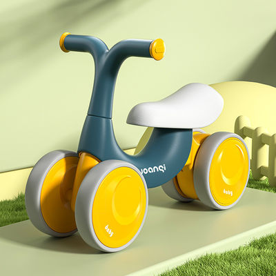 Voiture d'équilibre en plastique orange avec patin à roulettes silencieux et design vert