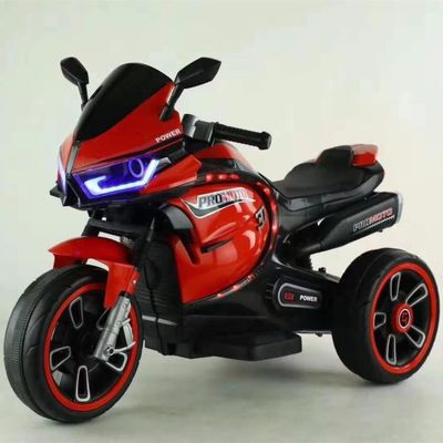 Tricycle à moto électrique blanche pour enfants avec lumière colorée et moteur 380*2