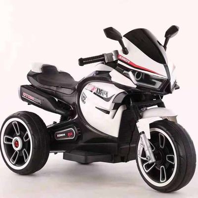 Tricycle à moto électrique blanche pour enfants avec lumière colorée et moteur 380*2