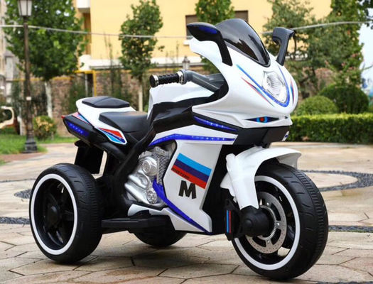 Les enfants de 2 à 8 ans montent sur une moto avec de la musique et de la lumière / batterie rechargeable 12V