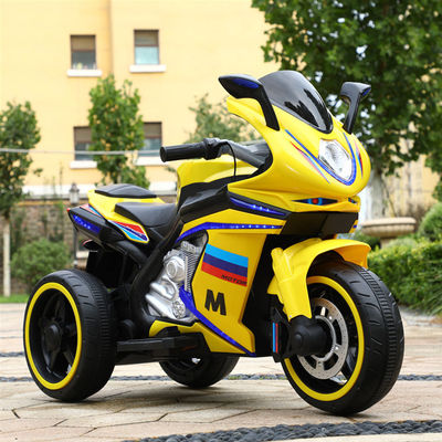 Les enfants de 2 à 8 ans montent sur une moto avec de la musique et de la lumière / batterie rechargeable 12V