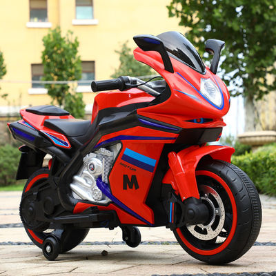 Les enfants de 2 à 8 ans montent sur une moto avec de la musique et de la lumière / batterie rechargeable 12V