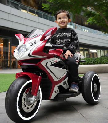 Fabrication d'une voiture de moto à deux roues de 12 v7 540 à moteur pour enfants en rouge bleu rose