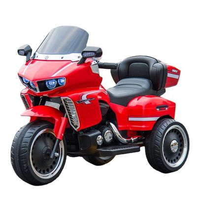 Des enfants en plastique montent sur une mini moto avec une fonction d'éducation précoce et une histoire anglaise
